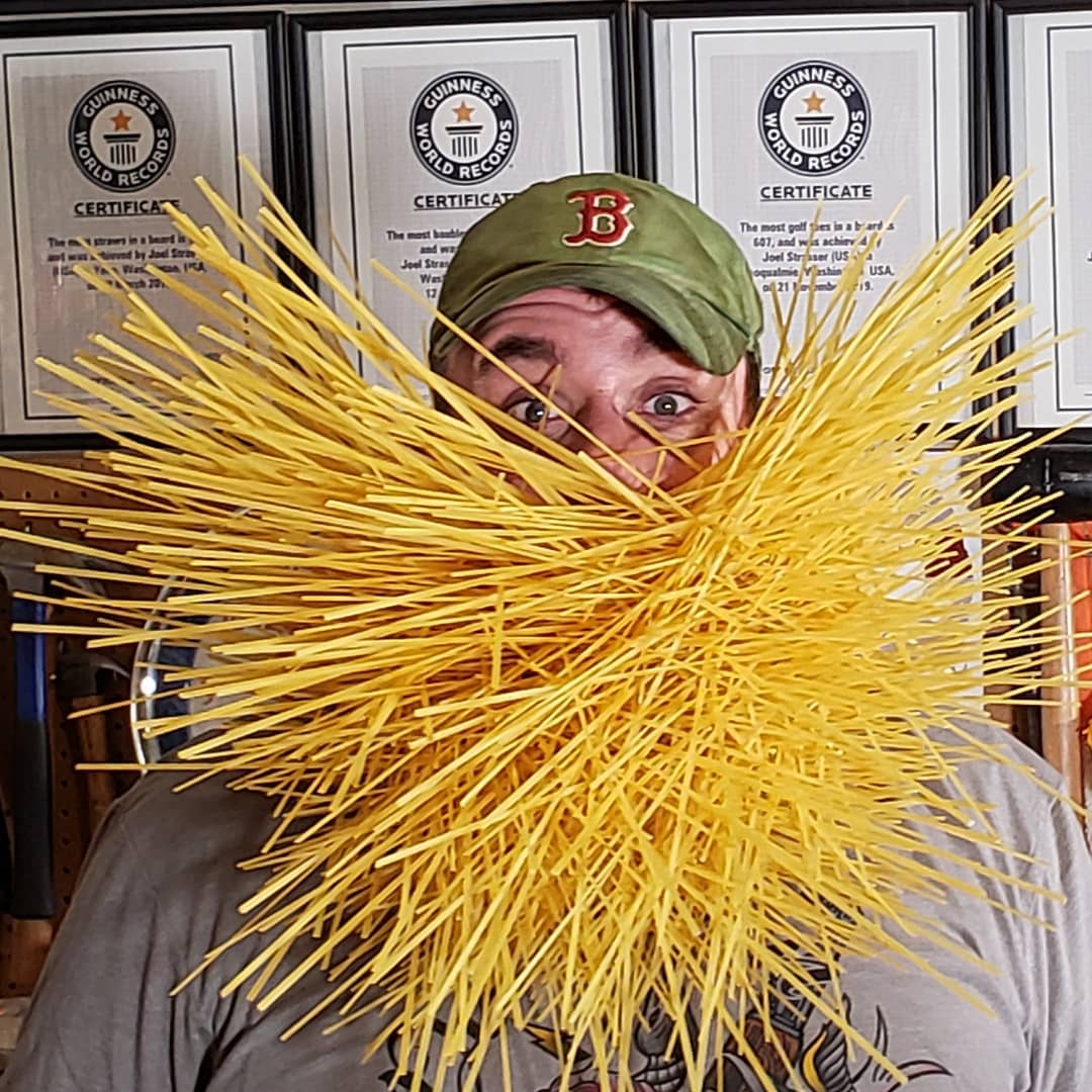 Man holds NINE world records for putting everything from forks to straws in his beard