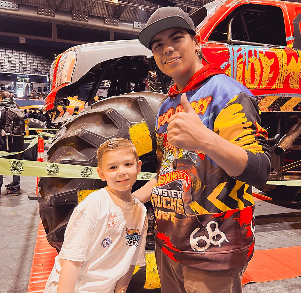 Charlie with the driver of Monster Truck Demo Derby